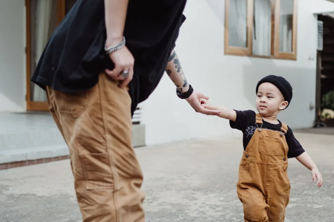 Father's Day Gifts: 16 Smart Ideas That Beat Boring Socks A father and son walking outdoors together, the kind of shared time that beats most Father's Day gifts